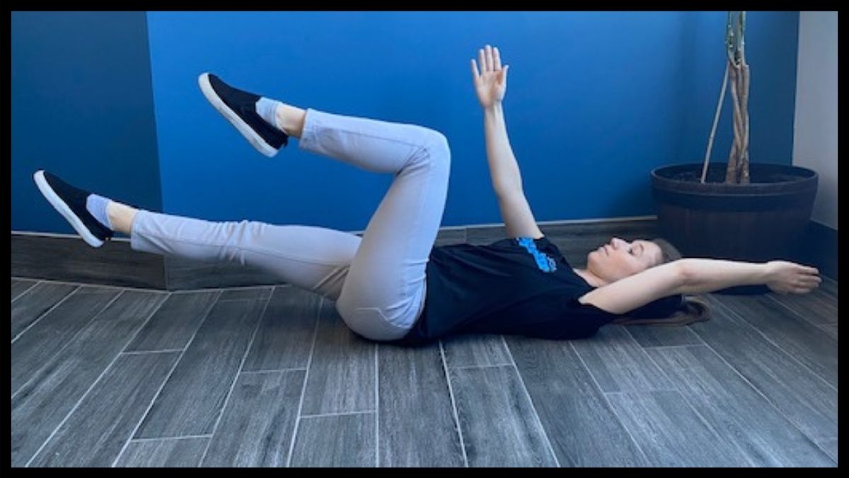 Lie down with one arm up and one leg up in sitting pose, with other arm and leg stretched out flat