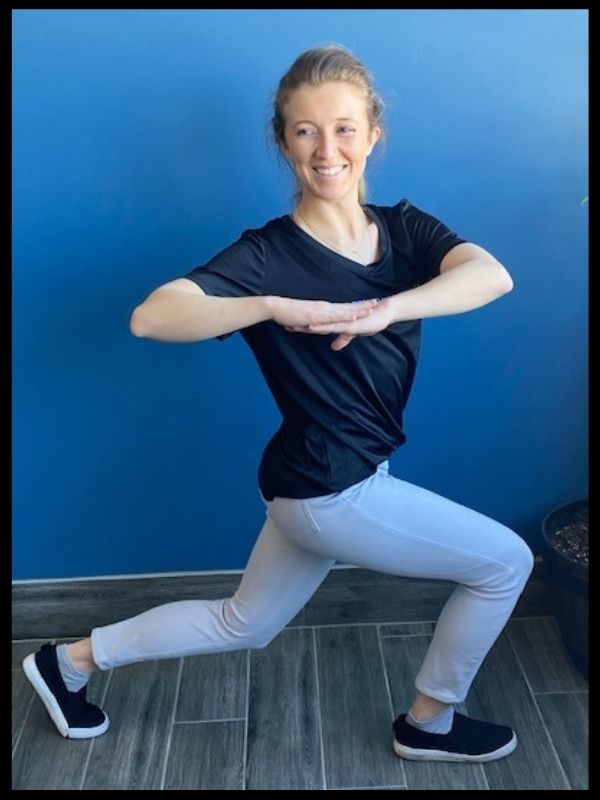 Lunge with arms crossed and twist back