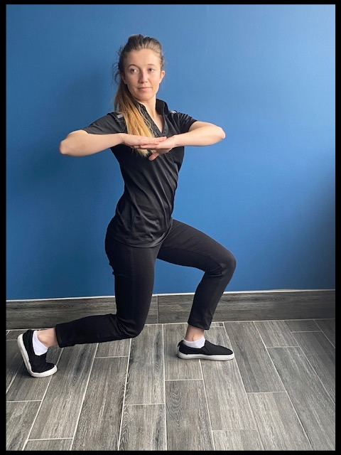 Hold arms together with elbows out, and twist your hips side ways kneeling.